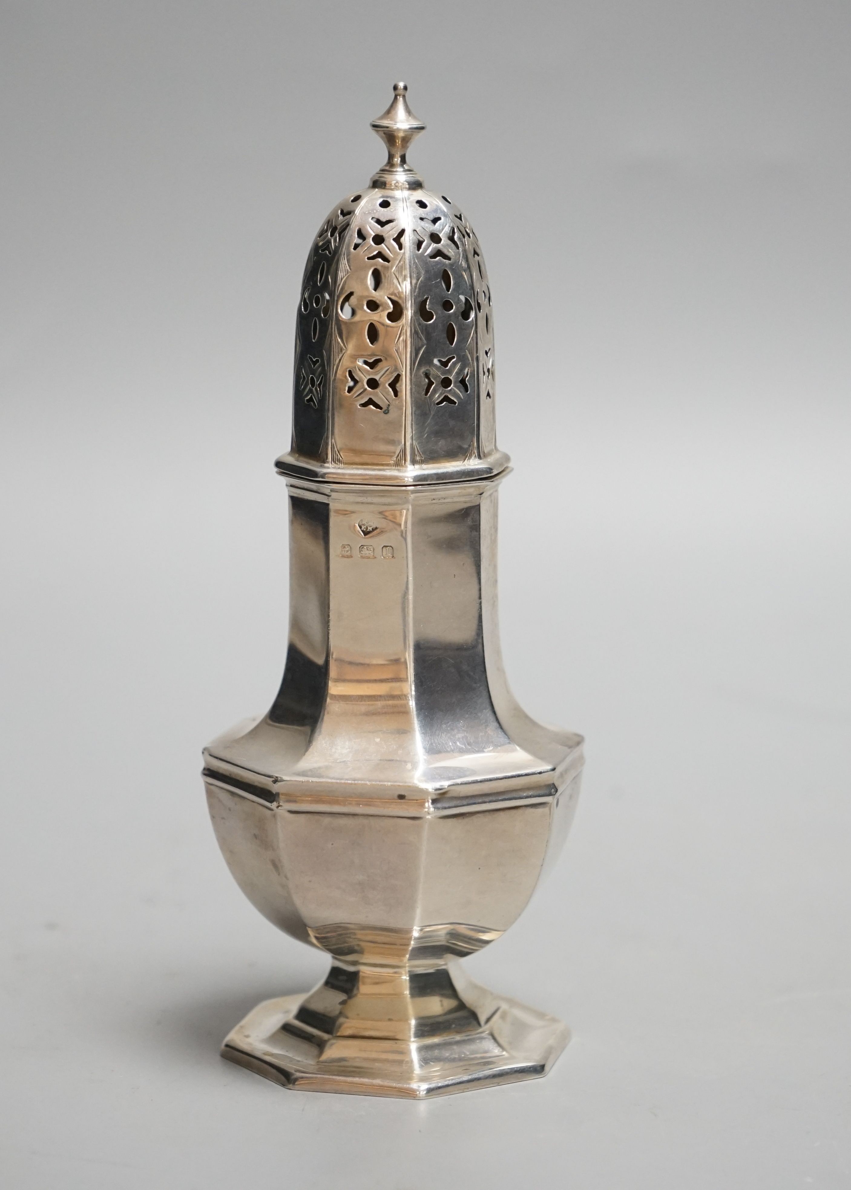 A George V silver octagonal sugar caster, Birmingham, 1910, 15.4cm, 93 grams.